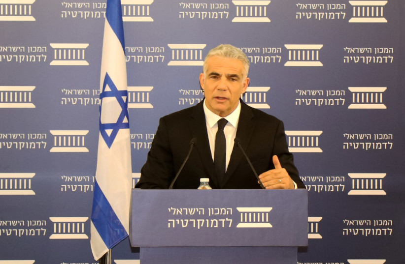 Opposition leader Yair Lapid speaks at an Israel Democracy Institute video conference, July 27, 2020 (photo credit: ISRAEL DEMOCRACY INSTITUTE)