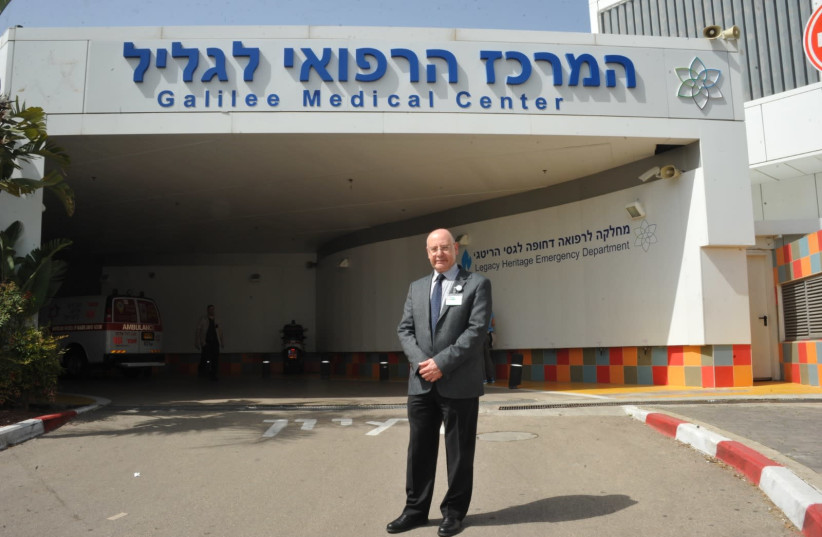 Dr. Masad Barhoum stands outside the Galilee Medical Center (credit: RONI ALBERT)