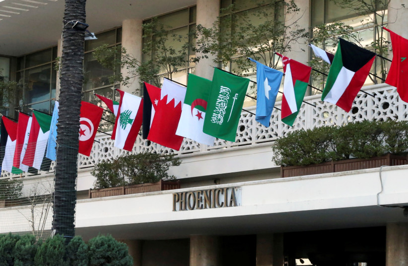 Flags of Arab League member countries on display at Beirut's Phoenicia Hotel, Lebanon January 18, 2019 (credit: MOHAMED AZAKIR / REUTERS)