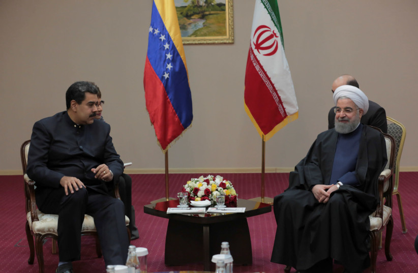 Venezuela's President Nicolas Maduro (L) meets with Hassan Rouhani, president of the Islamic Republic of Iran, in Astana, Kazakhstan September 10, 2017. (photo credit: REUTERS)