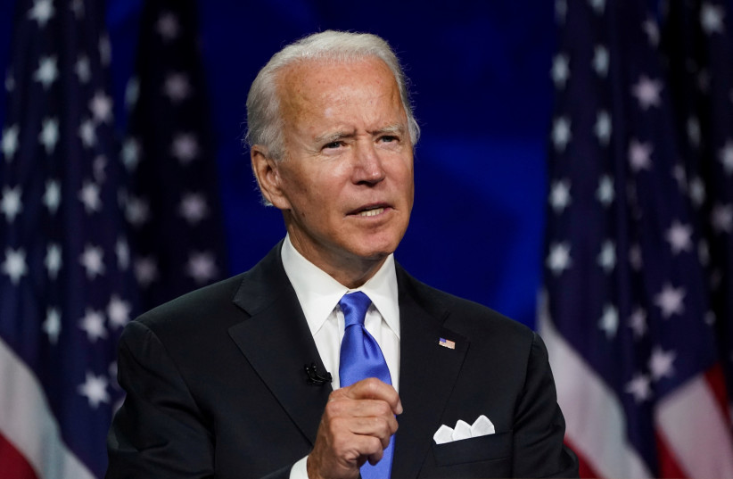 Former U.S. Vice President Joe Biden accepts the 2020 Democratic presidential nomination during a speech delivered for the largely virtual 2020 Democratic National Convention from the Chase Center in Wilmington, Delaware, U.S., August 20, 2020 (photo credit: REUTERS/KEVIN LAMARQUE)