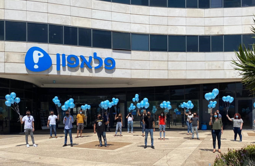 Pelephone employees release balloons as a sign of showing support in the nationwide protests against sexual violence, August 23, 2020.  (photo credit: PELEPHONE)