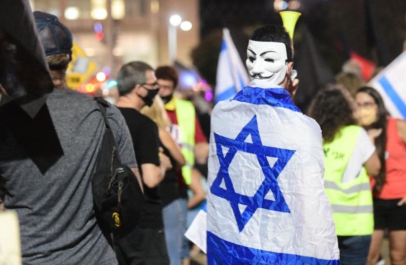 Protesters gathering at Rabin Square, Tel Aviv, August 27, 2020.  (photo credit: SASSONI AVSHALOM)