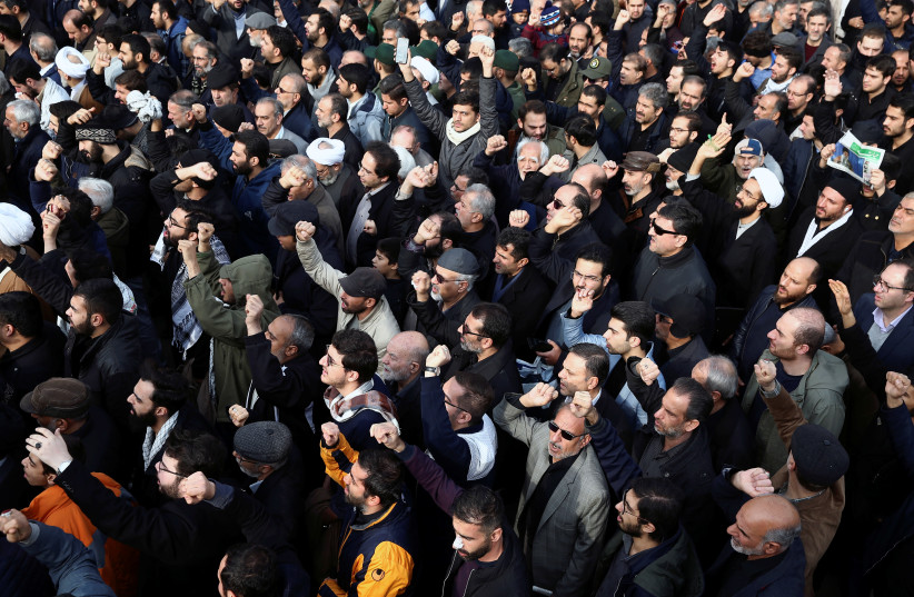 Demonstrators attend a protest against the assassination of the Iranian Major-General Qassem Soleimani, head of the elite Quds Force, and Iraqi militia commander Abu Mahdi al-Muhandis who were killed in an air strike in Baghdad airport, in Tehran, Iran January 3, 2020 (photo credit: WANA (WEST ASIA NEWS AGENCY)/NAZANIN TABATABAEE VIA REUTERS)