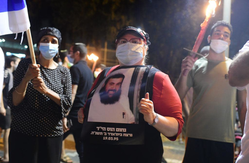Protest rally at site of stabbing attack in Petah Tikva, August 29, 2020 (photo credit: AVSHALOM SASSONI)