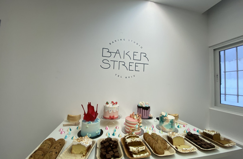 An assortment of cakes, cookies and brownies are seen on display at Baker Street TLV. (photo credit: ANNA AHRONHEIM)