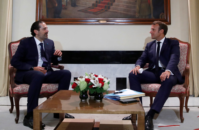French President Emmanuel Macron meets with former Lebanese Prime Minister Saad Hariri at the Pine Residence, the official residence of the French ambassador to Lebanon, in Beirut August 31, 2020. (photo credit: REUTERS)