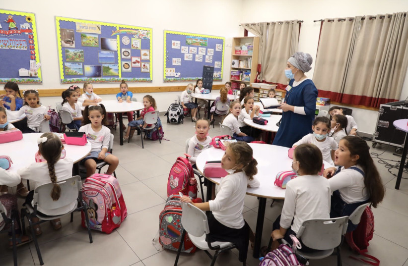 Students settle in for the first day of the new school year, Mevo Horon, September 1 (photo credit: MARC ISRAEL SELLEM/THE JERUSALEM POST)