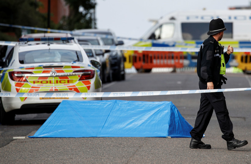 A police officer is seen near the scene of reported stabbings in Birmingham, Britain, September 6, 2020 (photo credit: REUTERS/PHIL NOBLE)