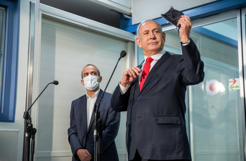 Prime Minister Benjamin Netanyahu and coronavirus czar Prof. Ronni Gamzu  (photo credit: EMIL SALMAN/POOL)