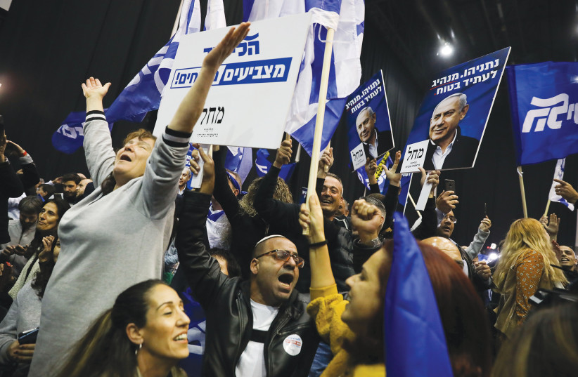 SUPPORTERS OF Prime Minister Benjamin Netanyahu celebrate after the last election in March. (photo credit: OLIVIER FITOUSSI/FLASH90)