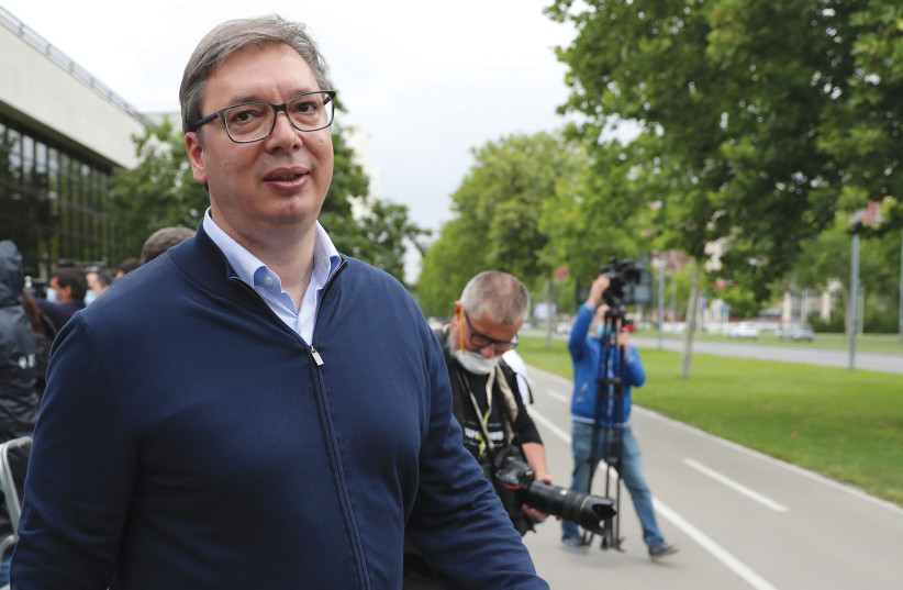 SERBIAN PRESIDENT Aleksandar Vucic leaves a polling station after voting in the first national election since the coronavirus lockdown, in Belgrade on June 21. (photo credit: MARKO DJURICA/REUTERS)