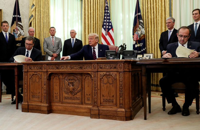 Serbia's President Aleksandar Vucic (Left) is seen at the Oval Office alongside US President Donald Trump and  Kosovo's Prime Minister Avdullah Hoti on September 4, 2020. (photo credit: LEAH MILLIS/REUTERS)