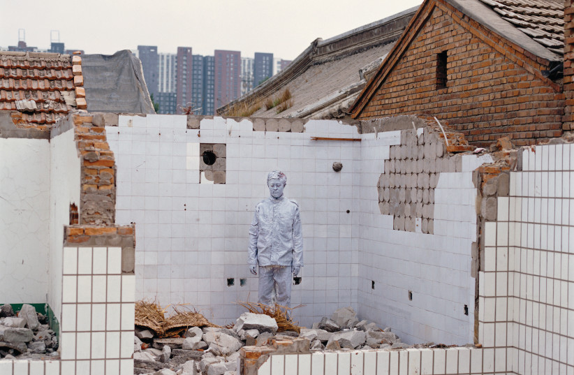 LIU BOLIN’S ‘Hiding in the City – Demolition’ work references the rapid urbanization process in China (photo credit: LIU BOLIN)