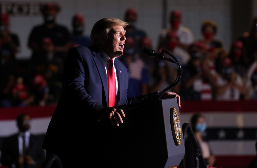 US President Donald Trump rallies with supporters at a campaign rally in Minden, Nevada, September 12, 2020 (photo credit: REUTERS / JONATHAN ERNST)