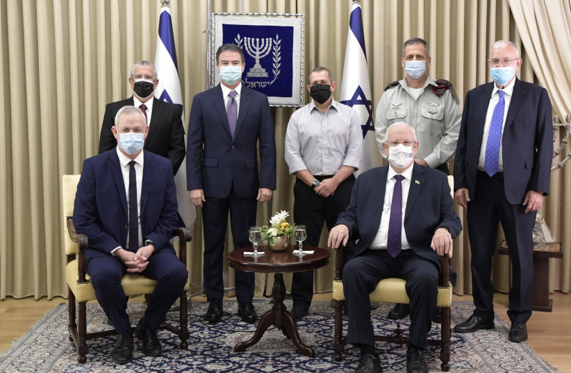 President Reuven Rivlin sits alongside Defense Minister Benny Gantz and other representatives of the prize-winning agencies, September 13, 2020 (photo credit: DEFENSE MINISTRY)