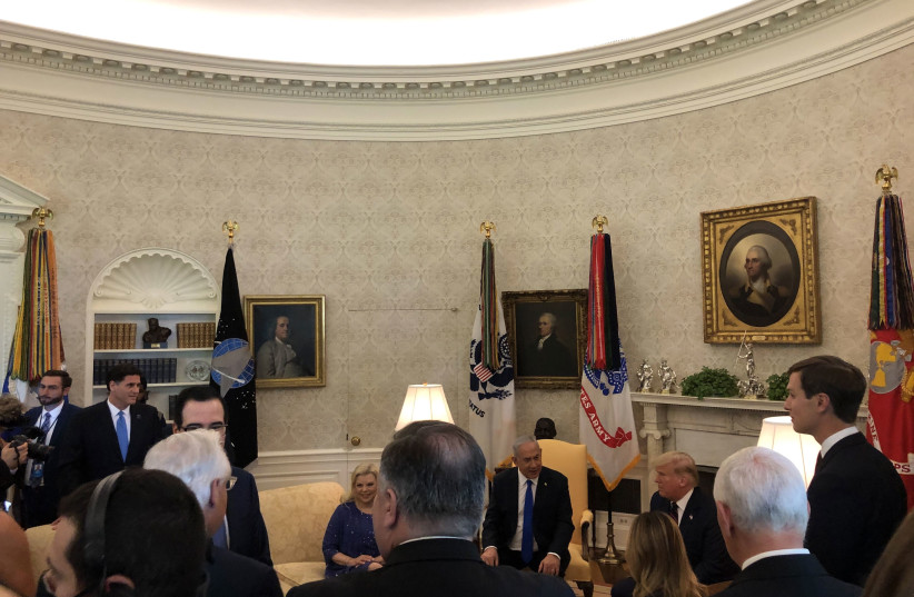 Benjamin Netanyahu meets with Donald Trump in the Oval Office, as Sara Netanyahu and Jared Kushner look on. September 15, 2020 (photo credit: Lahav Harkov)