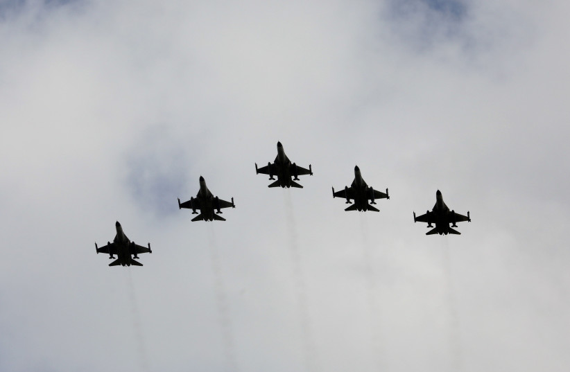Taiwanese F-16 fighter jets fly in formation during an inauguration ceremony in Taichung, Taiwan, August 28, 2020 (photo credit: REUTERS/ANN WANG)