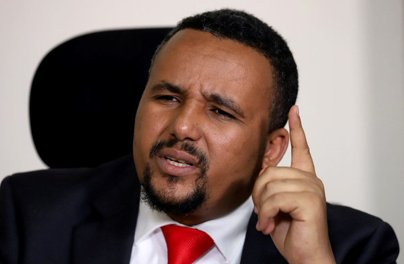 Jawar Mohammed, an Oromo activist and leader of the Oromo protest speaks during a Reuters interview at his house in Addis Ababa, Ethiopia October 23, 2019.  (photo credit: REUTERS/TIKSA NEGERI)