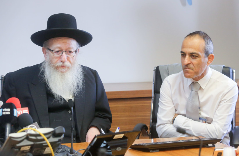 Former health minister Ya’acov Litzman with Prof. Ronni Gamzu at a news conference in October 2019. Litzman resigned as housing and construction minister to protest Israel’s High Holy Day lockdown (photo credit: MARC ISRAEL SELLEM)
