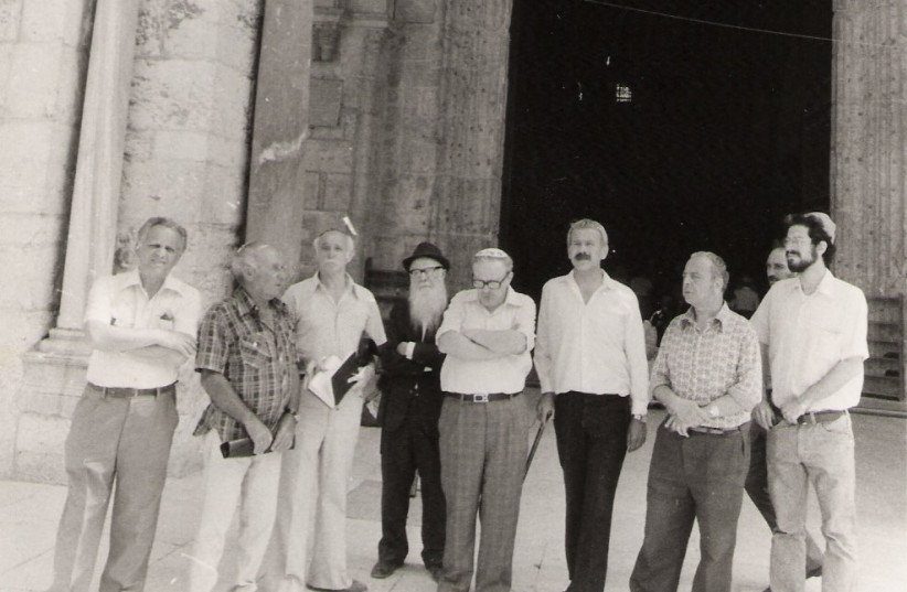 RABBI MOSHE SEGEL (fourth from left) with the writer (right) at prayer before the Al-Aksa Mosque, 1979. Gershon Solomon is sixth from left (photo credit: YISRAEL MEDAD)