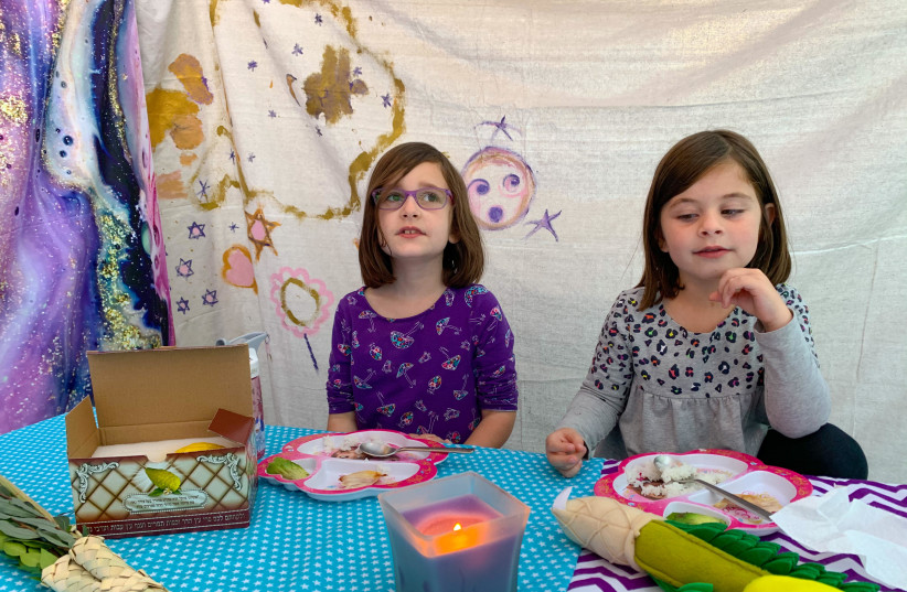 GET THE family involved and paint a canvas drop cloth for one of your Sukkah walls (photo credit: MARTI KERNER)