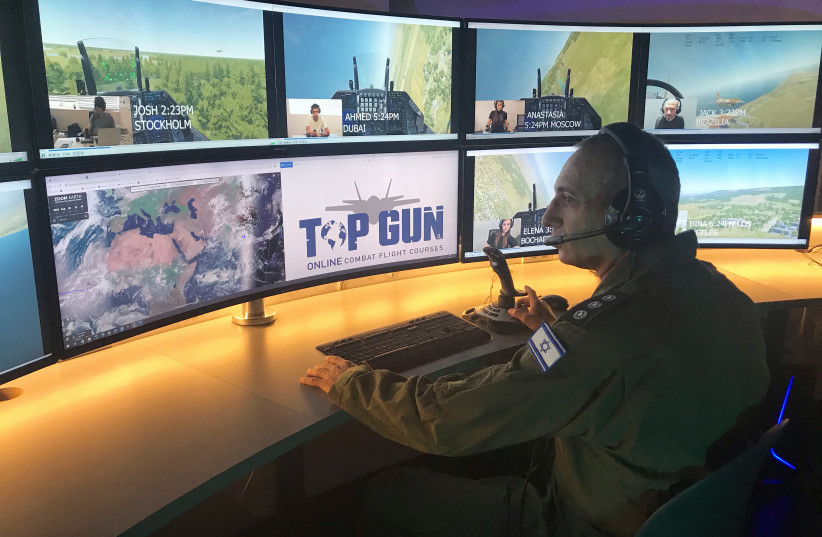 IAF Colonel (res.) Kobi Regev monitors the online simulated flights in real-time. (photo credit: REUT PHILIPOVITCH)