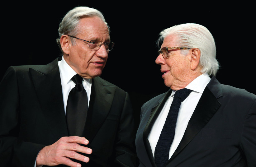 STAR REPORTERS Bob Woodward (left) and Carl Bernstein at the White House Correspondents’ dinner in 2017. (photo credit: REUTERS/JONATHAN ERNST)