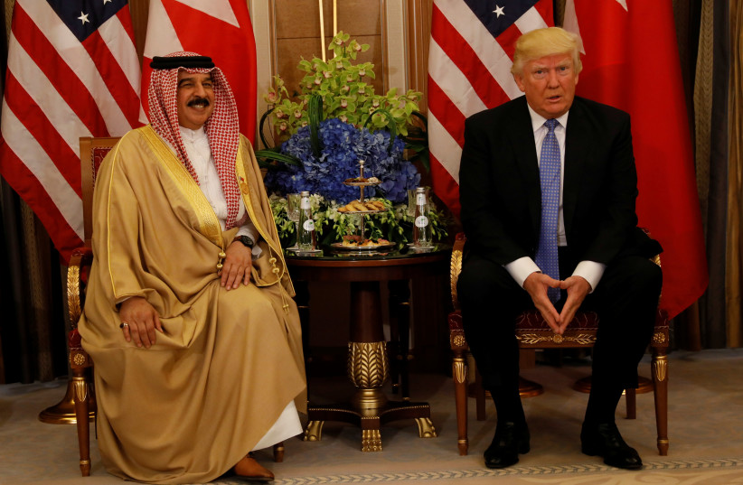 U.S. President Donald Trump meets with Bahrain's King Hamad bin Isa Al Khalifa in Riyadh, Saudi Arabia, May 21, 2017 (photo credit: REUTERS / JONATHAN ERNST)