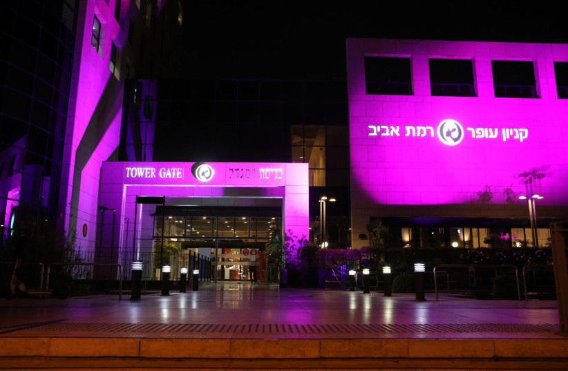 The Ofer Ramat Aviv Mall in Tel Aviv is seen illuminated with pink lights for World Breast Cancer Awareness Month. (photo credit: Courtesy)