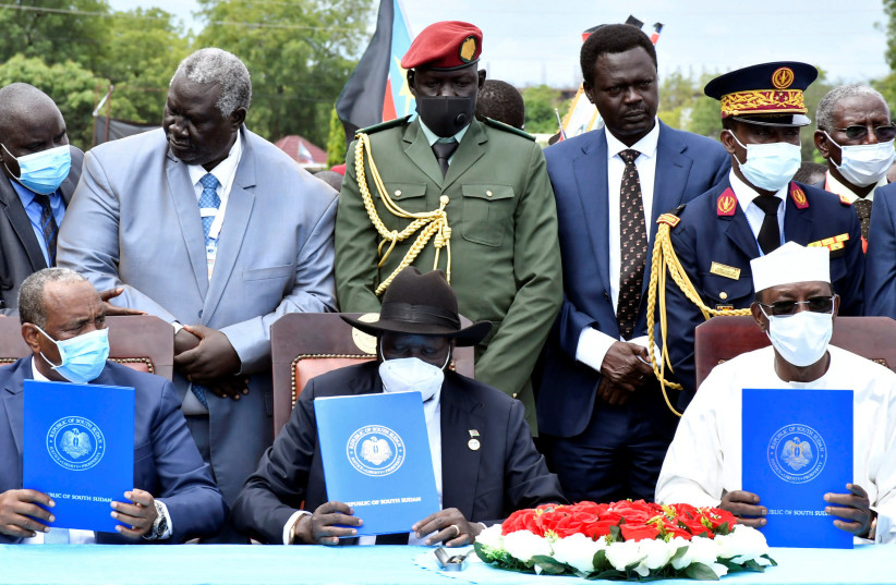 Sudan's Sovereign Council Chief General Abdel Fattah al-Burhan, South Sudan's President Salva Kiir, and Chad President Idriss Deby attend the signing of peace agreement between the Sudan's transitional government and Sudanese revolutionary movements to end decades-old conflict, in Juba, South Sudan (photo credit: REUTERS/JOK SOLOMUN)