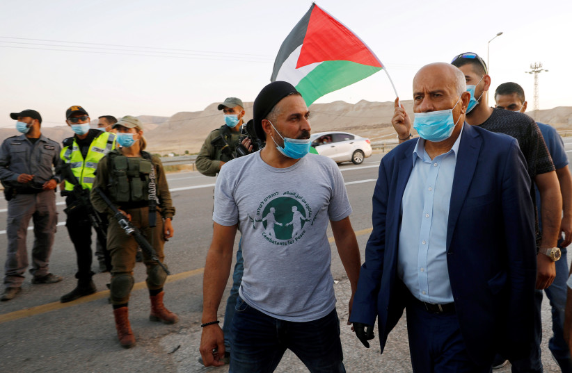Jibril Rajoub takes part in a protest against Israel's plan to apply sovereignty to parts of the West Bank, in Jericho June 27, 2020. (photo credit: REUTERS/MOHAMAD TOROKMAN)