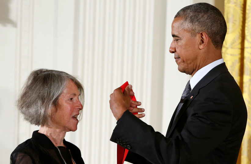 US President Barack Obama awards the 2015 National Humanities Medal to poet Louise Gluck at the White House, September 22, 2016.  (photo credit: REUTERS/GARY CAMERON)