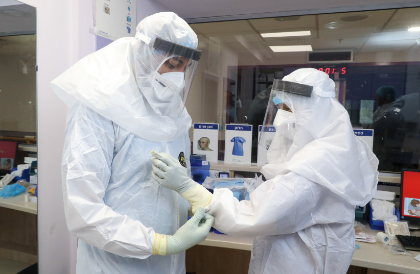 Preparing to enter the coronavirus ICU at Galilee Medical Center (photo credit: MARC ISRAEL SELLEM)