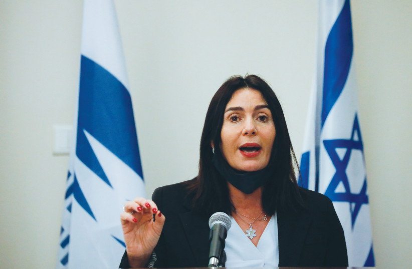 TRANSPORTATION MINISTER Miri Regev resorted to making threats that took advantage of the power she wields from her position in the government. This is a criminal offense, and it needs to be stopped.  (credit: OLIVIER FITOUSSI/FLASH90)
