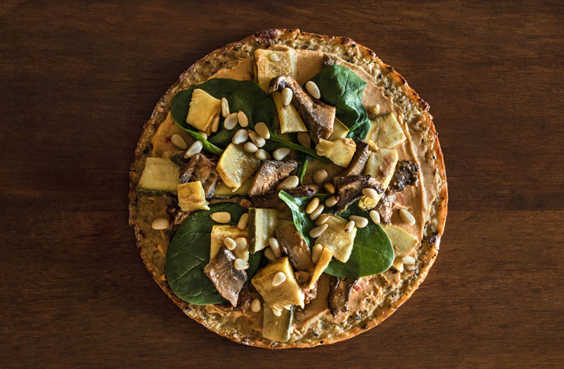 Hummus pizza. Yes, really.  (photo credit: MERRIL BUCKHORN/GETTY IMAGES)