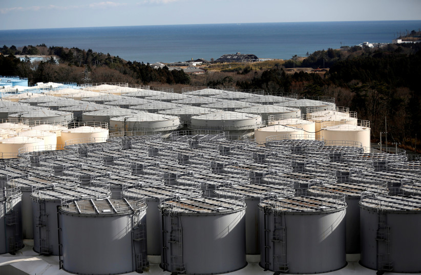 Storage tanks for radioactive water are seen at Tokyo Electric Power Co's (TEPCO) tsunami-crippled Fukushima Daiichi nuclear power plant in Okuma town, Fukushima prefecture, Japan February 18, 2019 (photo credit: REUTERS/ISSEI KATO)