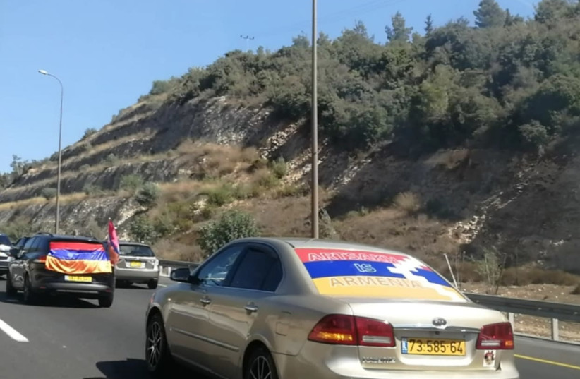 Dozens of cars covered with the colors of the Armenian flag make their way to the Knesset in Jerusalem to show support in Armenia and protest against Israel's defense cooperation with Azerbaijan, October 17, 2020. (photo credit: ATARA BEERI)