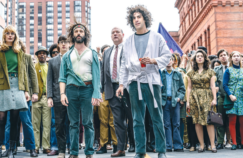 SACHA BARON Cohen (center right) as Abbie Hoffman in ‘The Trial of the Chicago 7.’ (photo credit: NIKO TAVERNISE/NETFLIX VIA JTA)
