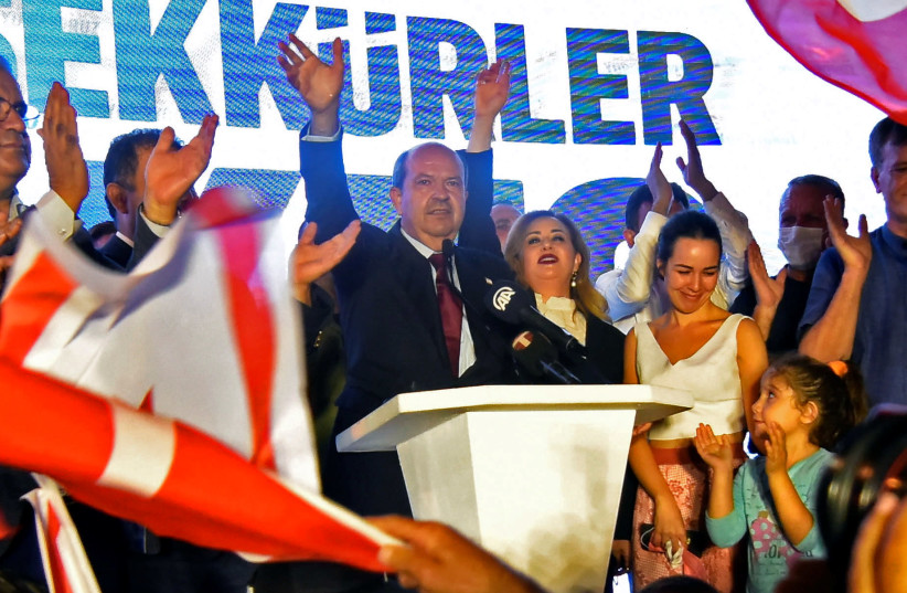 Turkish Cypriot politician Ersin Tatar celebrates his election victory in Turkish-controlled northern Nicosia, Cyprus October 18, 2020 (photo credit: REUTERS/HARUN UCAR)