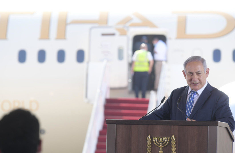 Prime Minister Benjamin Netanyahu welcomes the first UAE delegation to Israel (photo credit: AMOS BEN-GERSHOM/GPO)