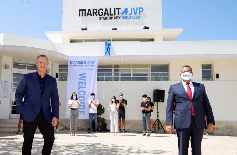 Margalit Startup City founder and chairman Erel Margalit pictured next to Jerusalem Mayor Moshe Lion in front of the Margalit Startup City Jerusalem offices. (photo credit: RIKI RACHMAN)