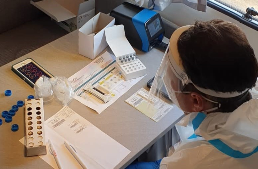 Rapid Sofia coronavirus test device in action (photo credit: SOFIA ISRAEL)