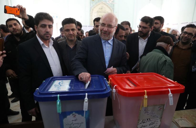 Mohammad Baqer Ghalibaf, a parliamentary candidate, casts his vote at a mosque in downtown Tehran, Iran February 21, 2020 (photo credit: HAMED MALEKPOUR/WANA VIA REUTERS)