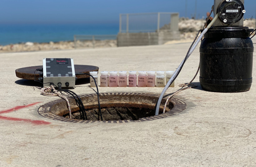 Kando kit installation at manhole of wastewater network with sensors and smart samples (photo credit: JENNY GELMAN/KANDO)