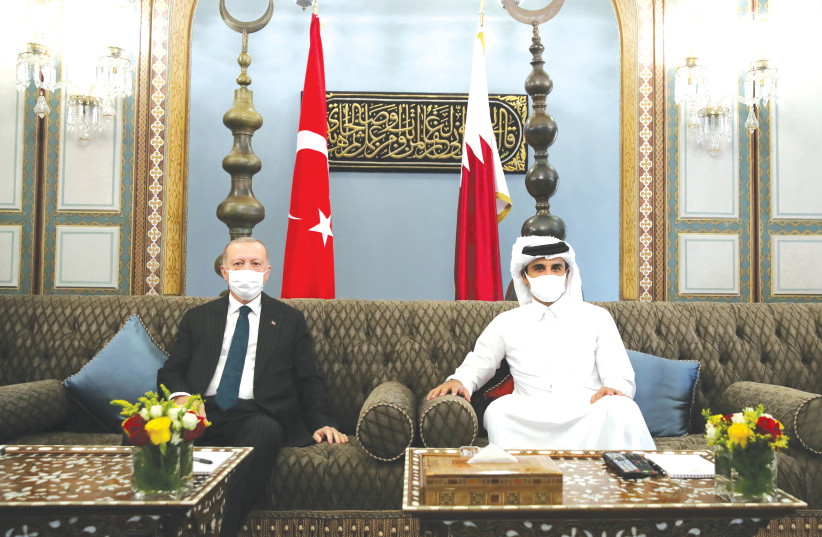 Turkish president Recep Tayyip Erdogan meets with Qatar’s Emir Sheikh Tamim bin Hamad Al Thani in Doha, Qatar, earlier this month. (photo credit: TURKISH PRESIDENTIAL PRESS OFFICE/VIA REUTERS)