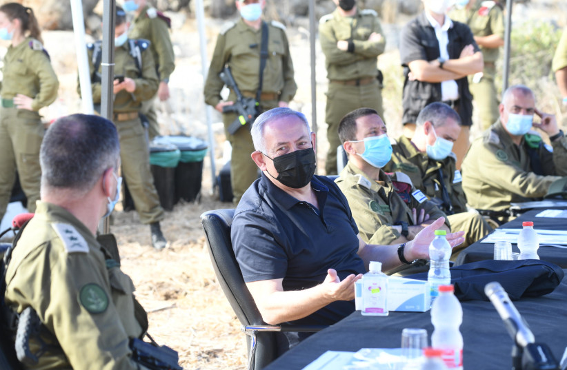 Prime Minister Benjamin Netanyahu visits site of the "Lethal Arrow" exercise in northern Israel, October 28, 2020. (photo credit: AMOS BEN GERSHOM, GPO)