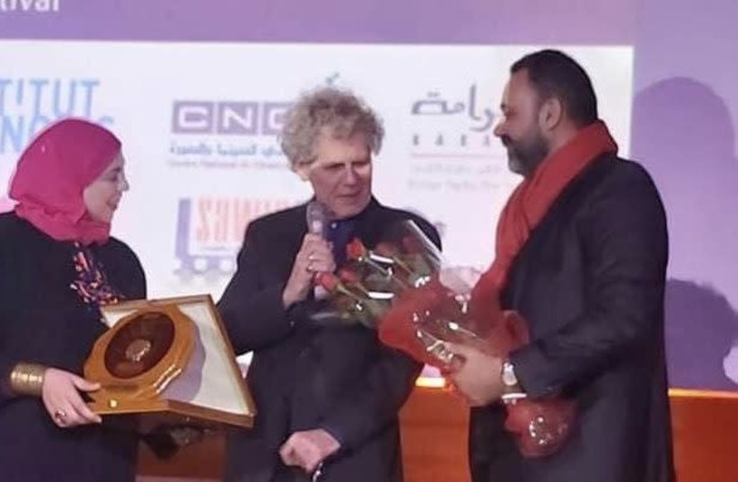 Jack Baxter (center) accepts the 'Prix de l’Espoir’ (Prize of Hope) award at the closing ceremony of the 6th International Human Rights Film Festival of Tunis in February. (photo credit: JACK BAXTER)