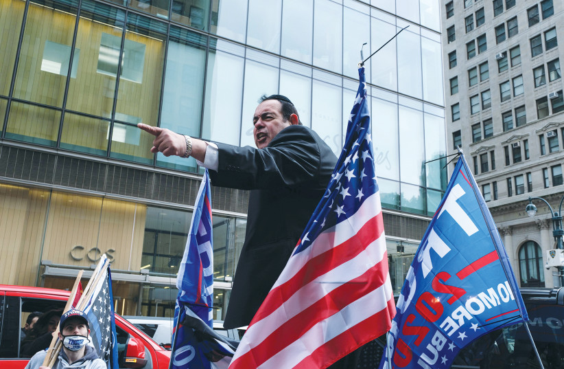 NEW YORK Jewish activist Heshy Tischler and other supporters of US President Donald Trump rally in Manhattan last weekend. (credit: YUKI IWAMURA/REUTERS)