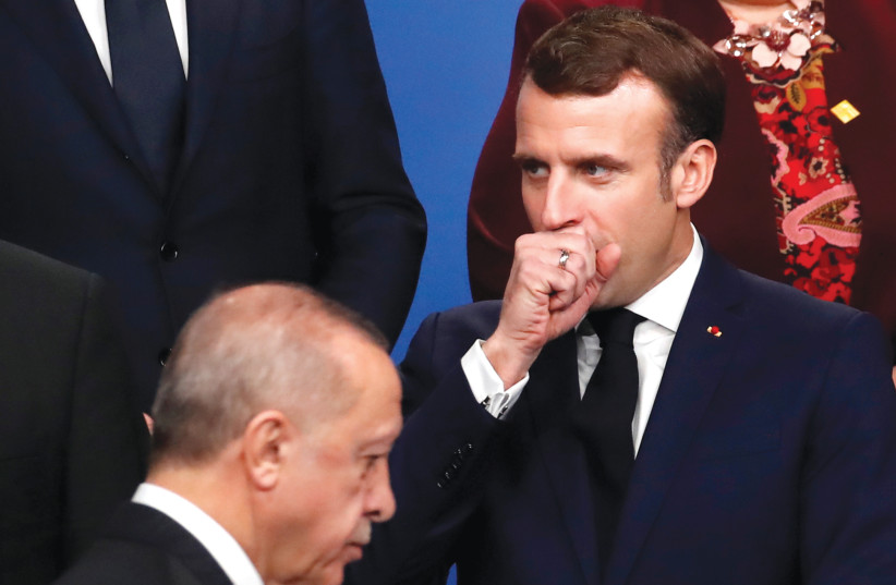 TURKISH PRESIDENT Recep Tayyip Erdogan called French President Emmanuel Macron’s mental health into question in response to the French president’s campaign to maintain secular values following the beheading of a teacher.  (photo credit: CHRISTIAN HARTMANN/REUTERS)